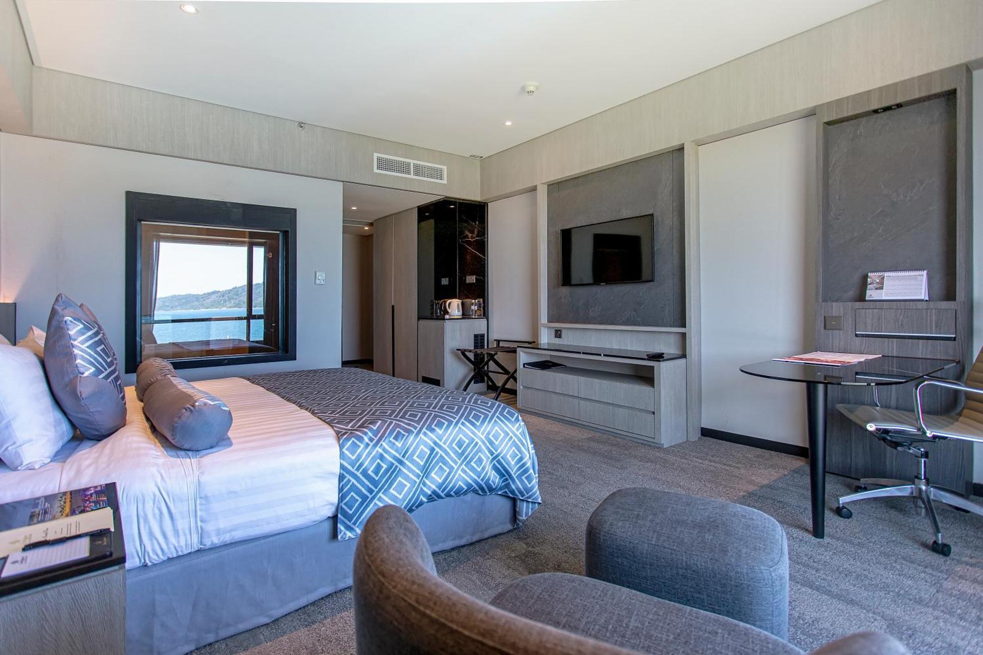 Отель The Pacific Sutera Кота-Кинабалу Экстерьер фото A room at the Protea Hotel Fire & Ice